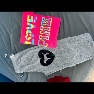 pink name logo tee shirt with the dog heart logo sweat pants